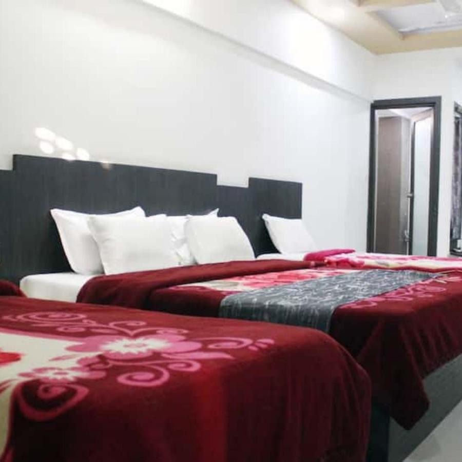 Hotel Long Stay Ahmedabad Esterno foto